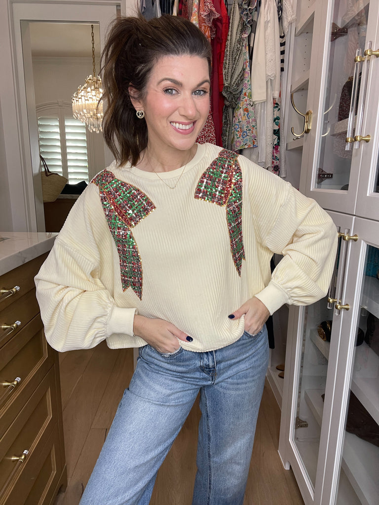 I'm a Gift Sequin Bow Corded Pullover in Cream