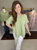 Best Behavior Peplum Top in Spring Green