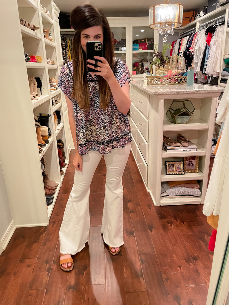 Susan Flares in White