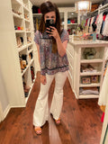 Susan Flares in White
